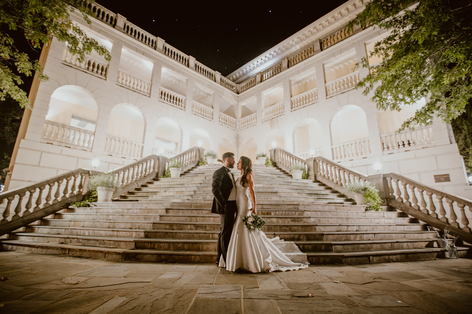 Lindsey and Lauren standing on a grand staircase at their Washington DC wedding